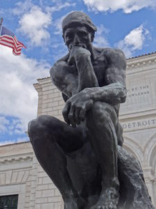 The Thinker of Auguste Rodin greets all visitors